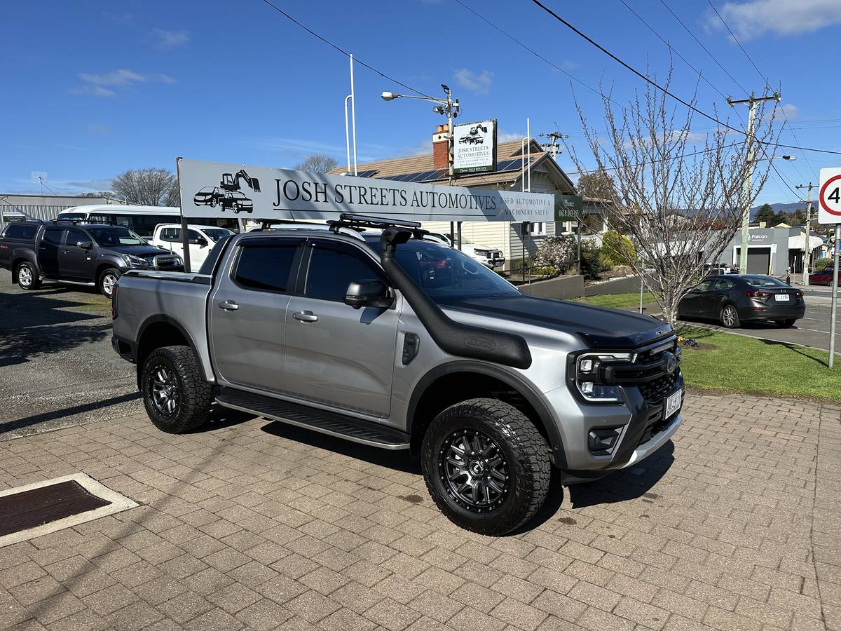 Silver Ford Ranger dual cab with snorkel and roof rack, sold by Streets Automotives in Deloraine
